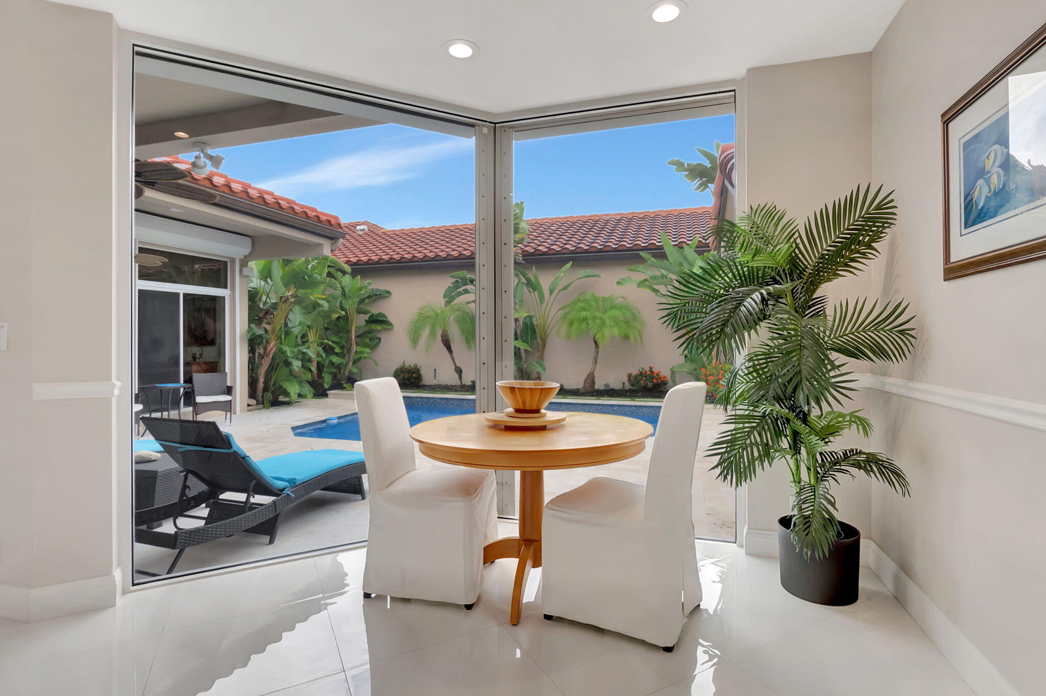 23164 Via Stel Boca Raton, FL 33433 - Photo 15 of 35 a view of a livingroom with furniture and floor to ceiling window