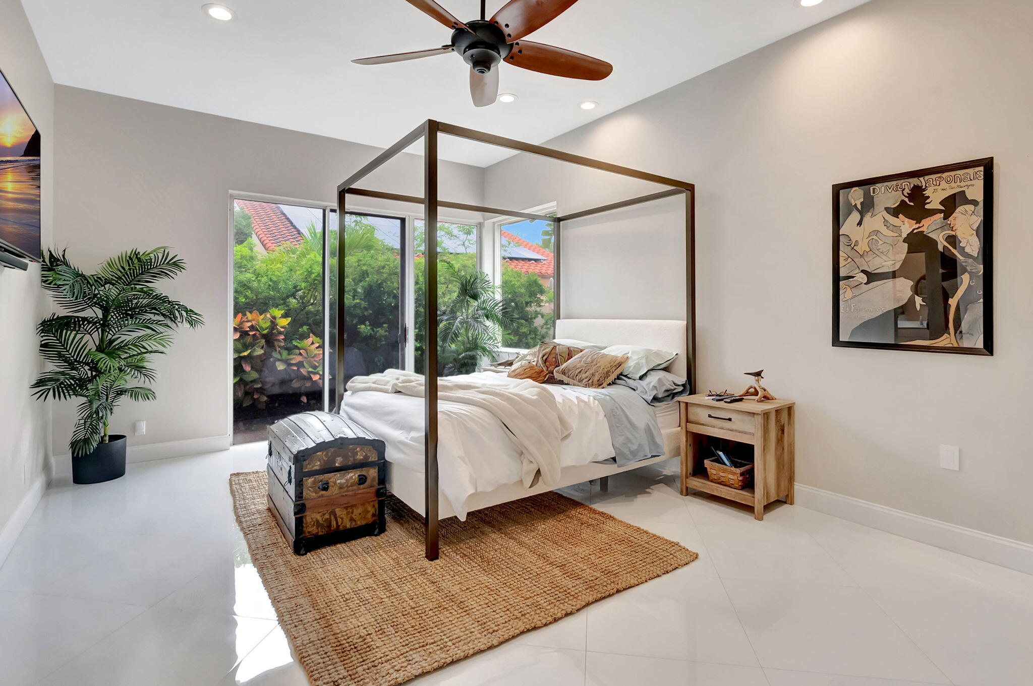 23164 Via Stel Boca Raton, FL 33433 - Photo 17 of 35 a bedroom with a bed a couch and potted plant