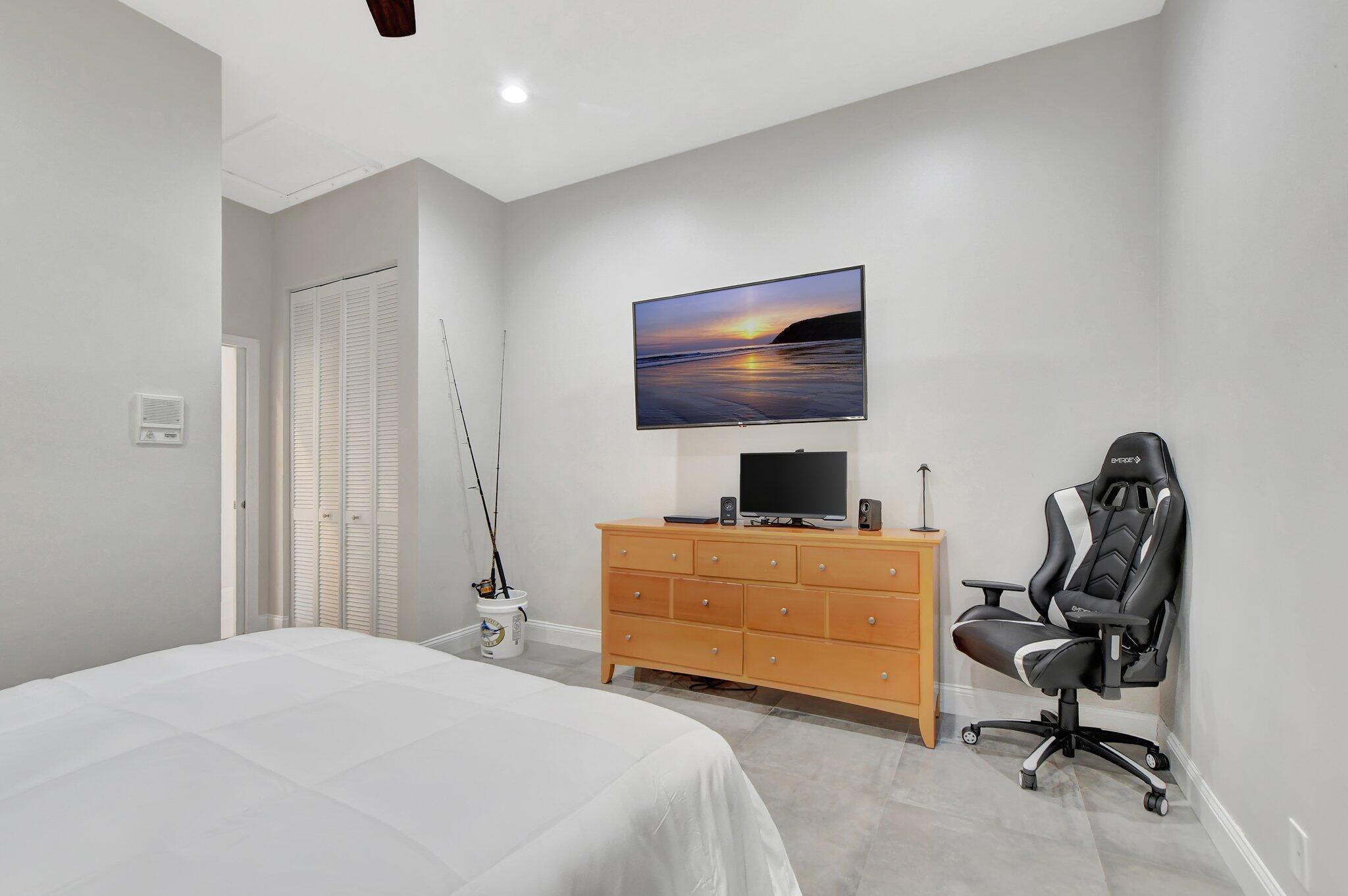 23164 Via Stel Boca Raton, FL 33433 - Photo 23 of 35 a bedroom with a workspace