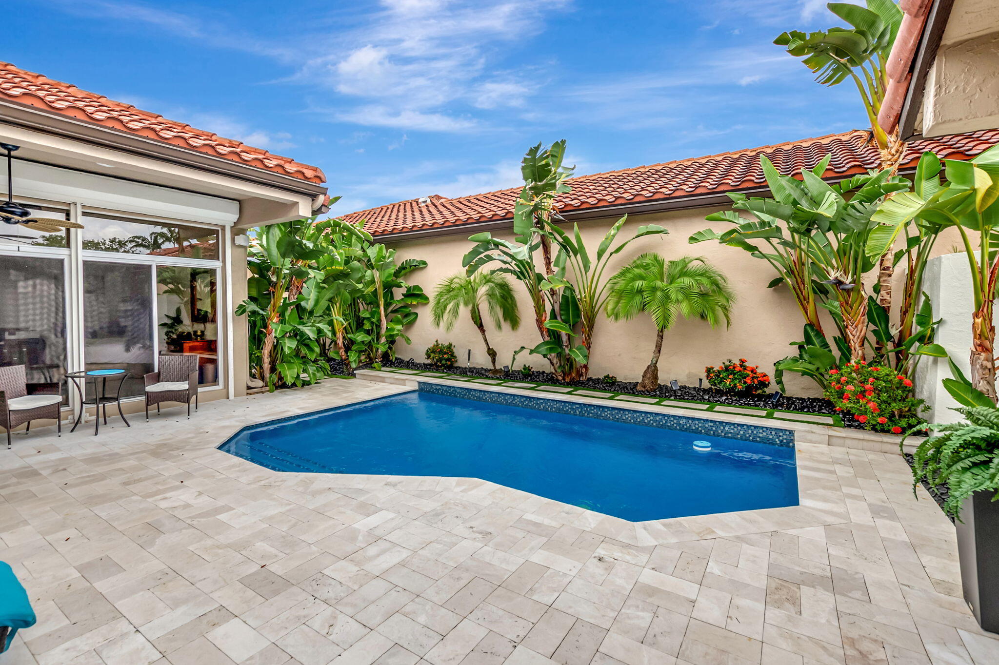 23164 Via Stel Boca Raton, FL 33433 - Photo 32 of 35 a view of swimming pool with outdoor seating