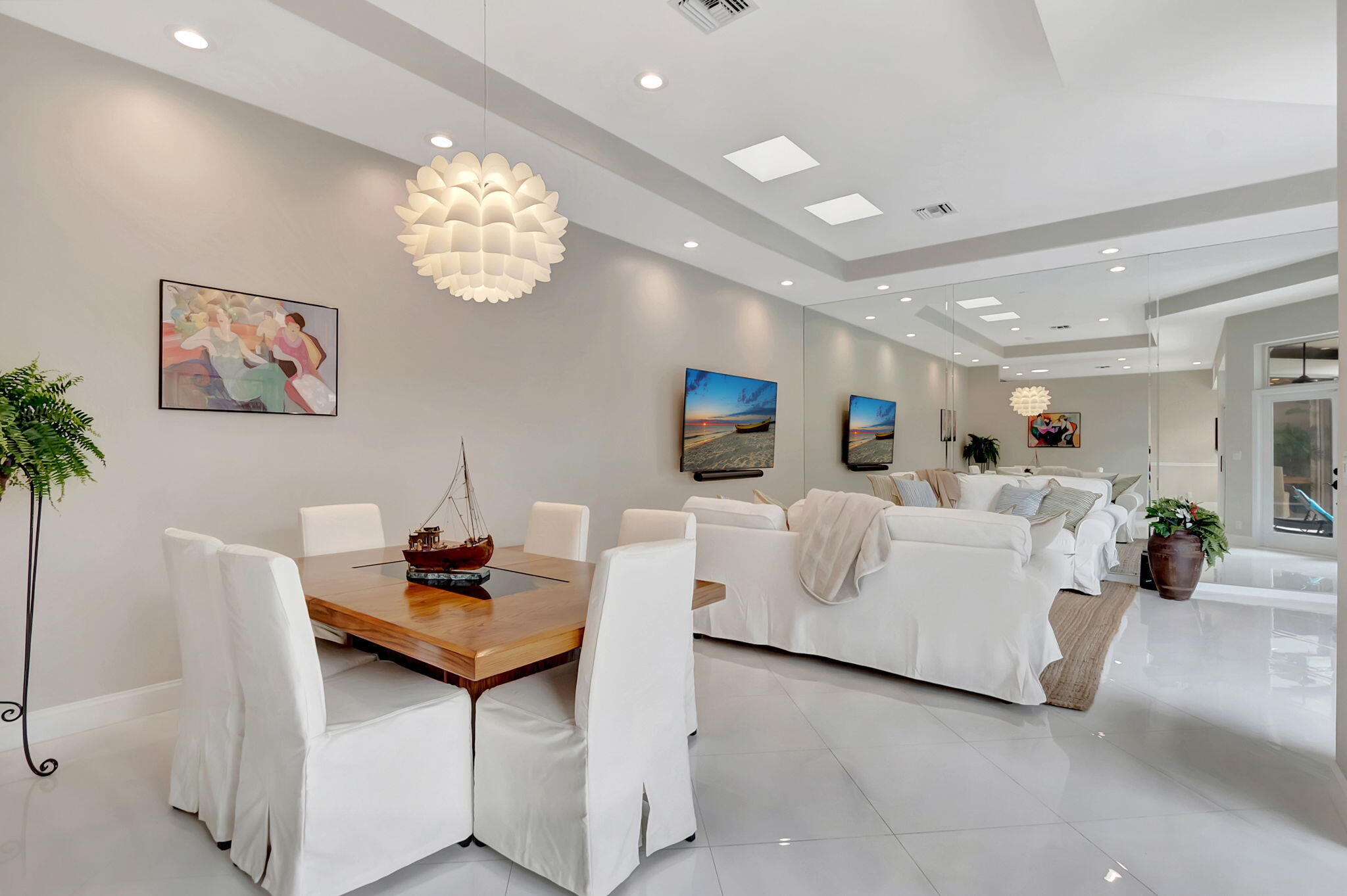 23164 Via Stel Boca Raton, FL 33433 - Photo 8 of 35 a living room with furniture and a chandelier