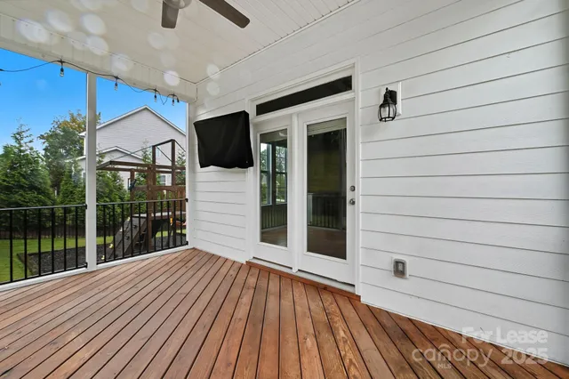 a view of balcony deck and wooden floor