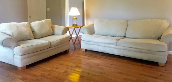 a living room with furniture and a couch