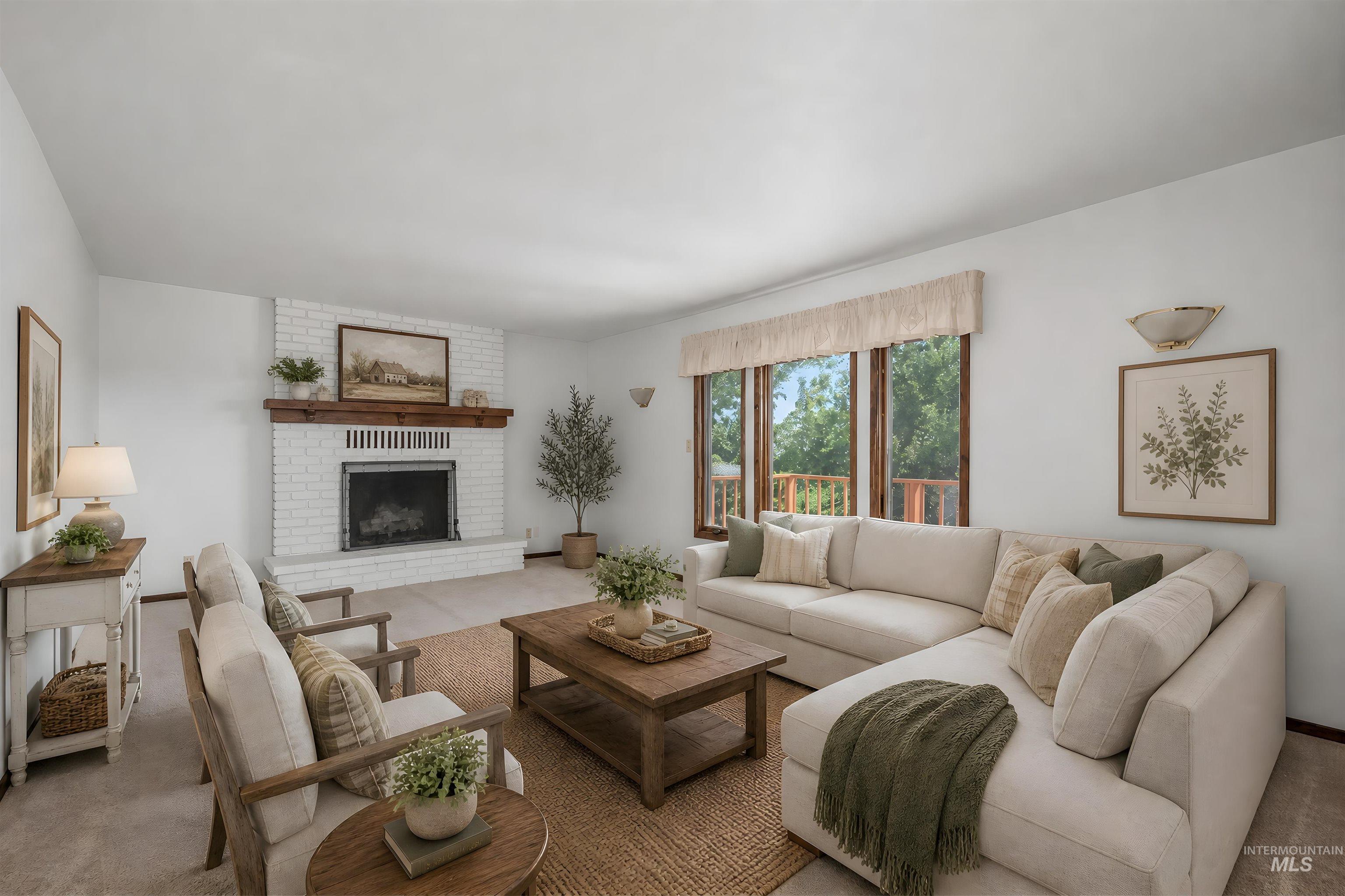1493 Cove Road Weiser, ID 83672 - Photo 14 of 50 Spacious living area featuring a white brick fireplace with a wood mantel, soft carpeting, and recessed lighting