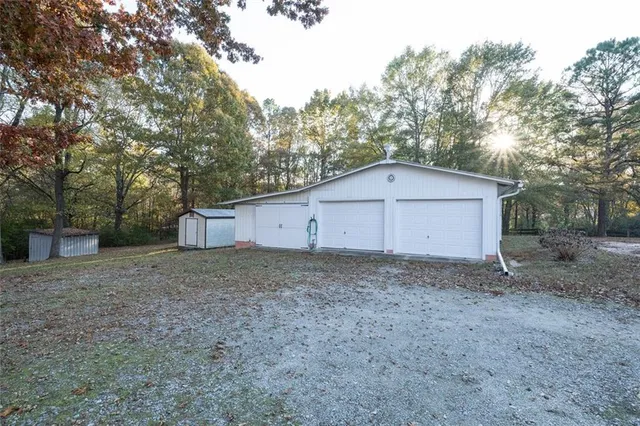 a house with trees in the background