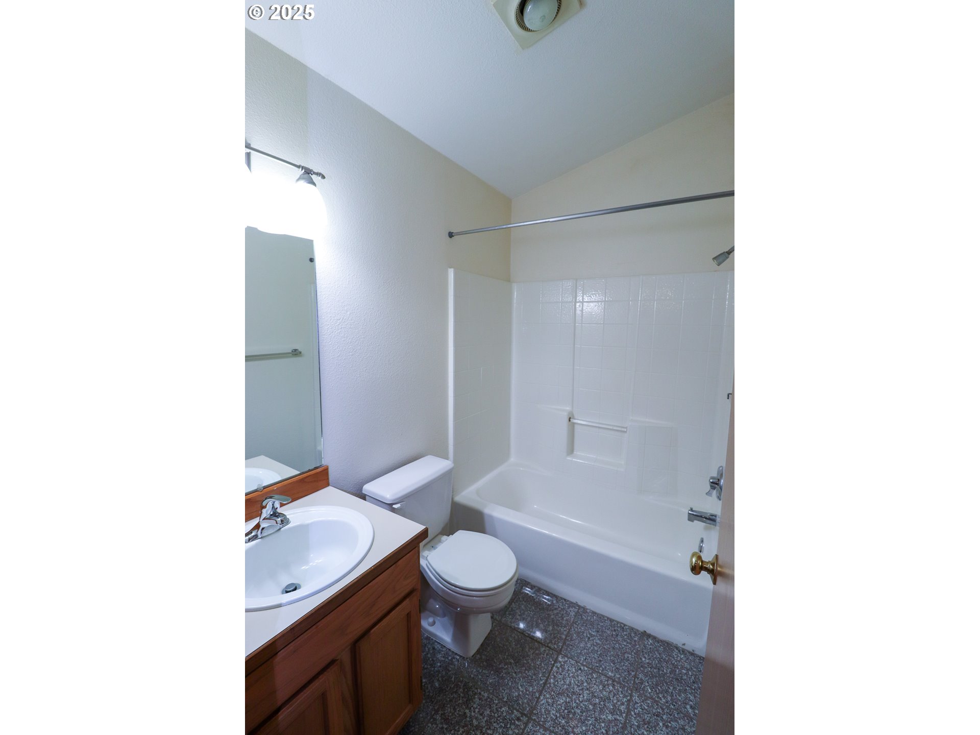 858 South 46th Street Springfield, OR 97478 - Photo 22 of 33 a bathroom with a granite countertop sink toilet a mirror and shower