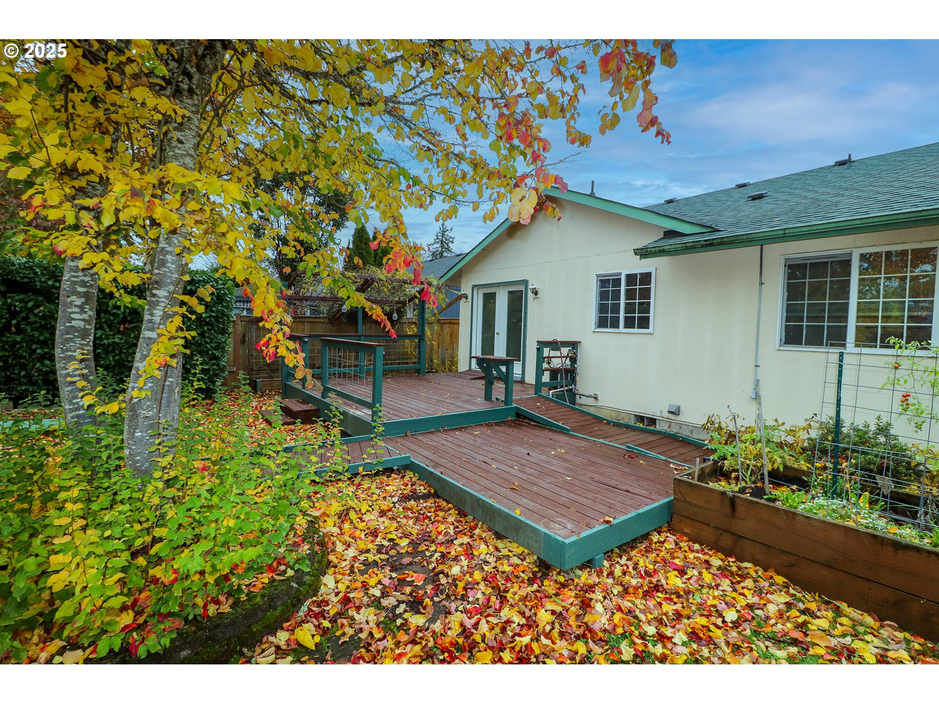 858 South 46th Street Springfield, OR 97478 - Photo 28 of 33 a view of a backyard with plants and a patio