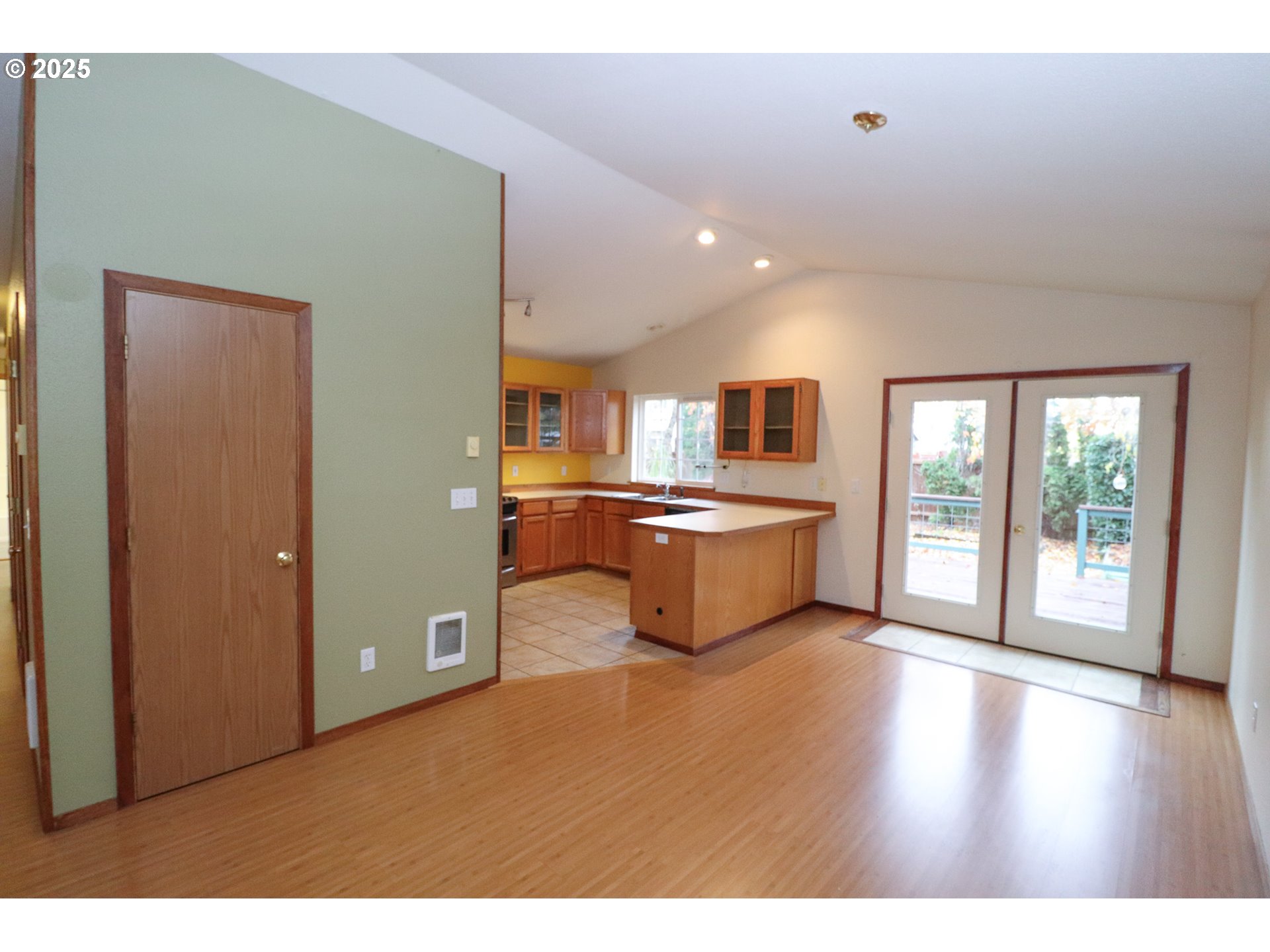 858 South 46th Street Springfield, OR 97478 - Photo 7 of 33 a living room with stainless steel appliances kitchen island granite countertop a stove and a refrigerator