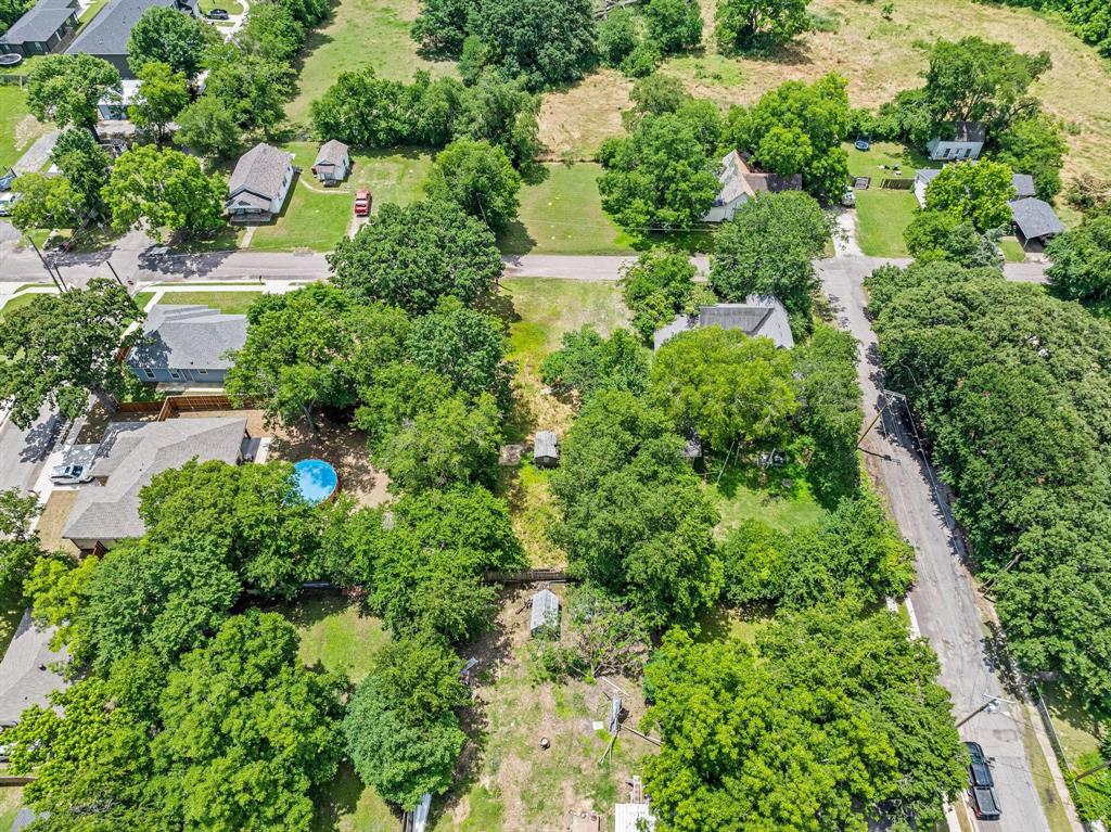 518 South 3rd Street Bonham, TX 75418 - Photo 12 of 19 an aerial view of residential house with outdoor space and trees all around