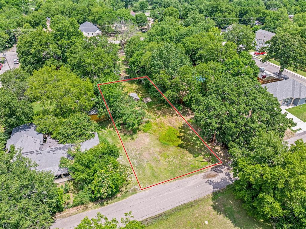 518 South 3rd Street Bonham, TX 75418 - Photo 3 of 19 an aerial view of residential house with outdoor space and trees all around