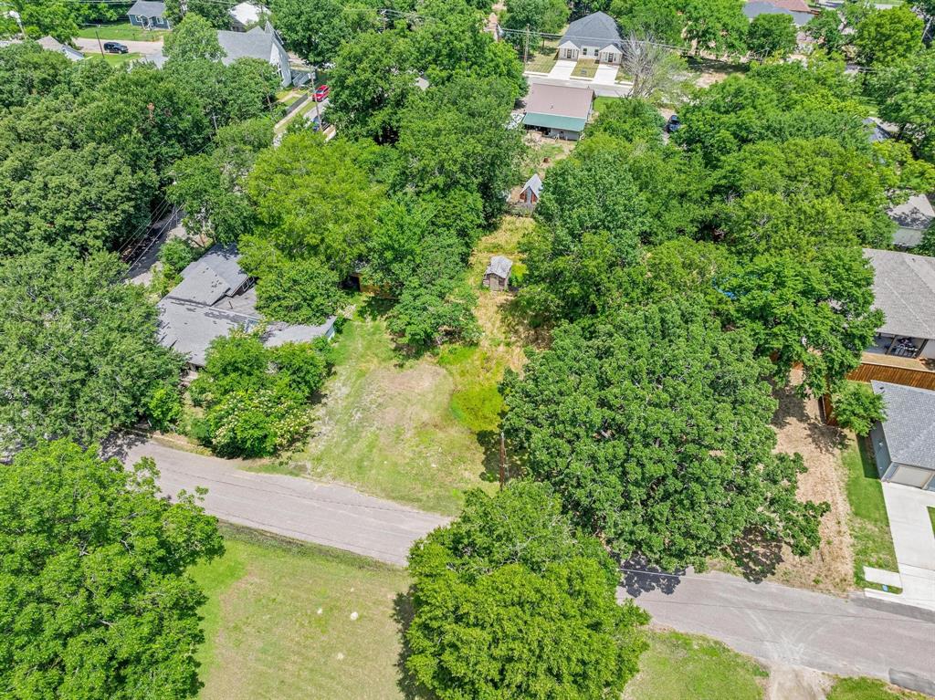518 South 3rd Street Bonham, TX 75418 - Photo 6 of 19 an aerial view of residential house with outdoor space and trees all around