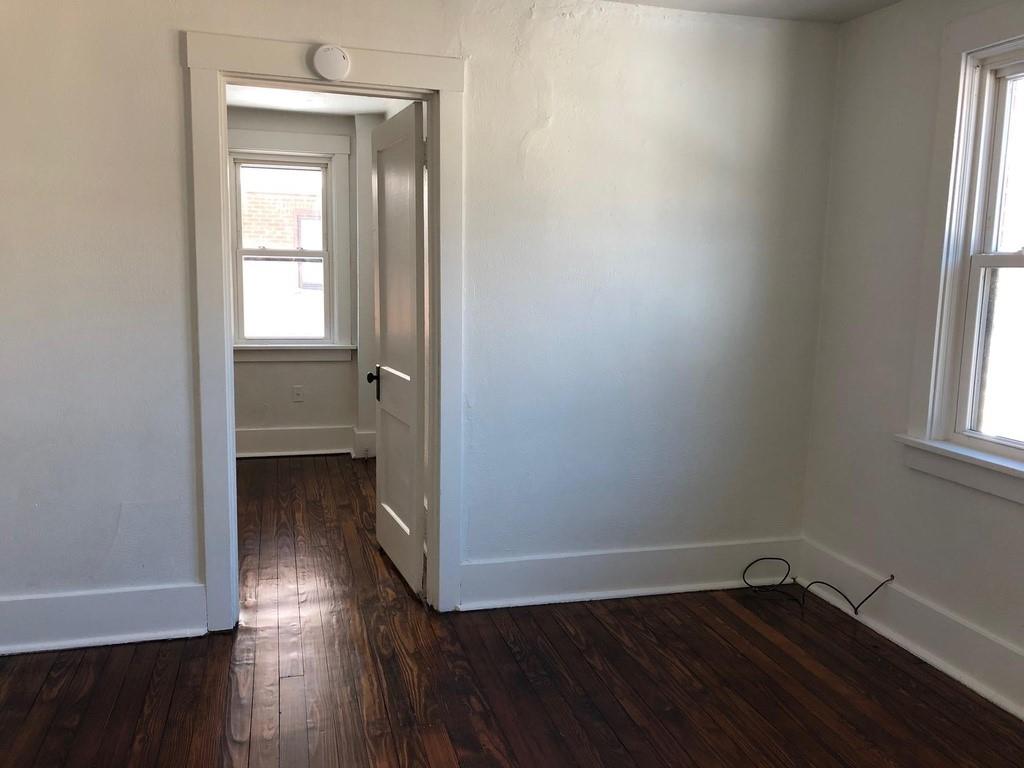 184 Provost Road Pittsburgh, PA 15234 - Photo 14 of 26 an empty room with wooden floor and a window