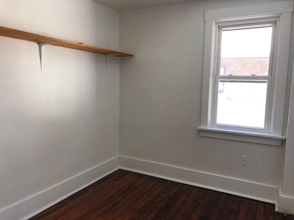 184 Provost Road Pittsburgh, PA 15234 - Photo 17 of 26 a view of a small space with wooden floor and a window