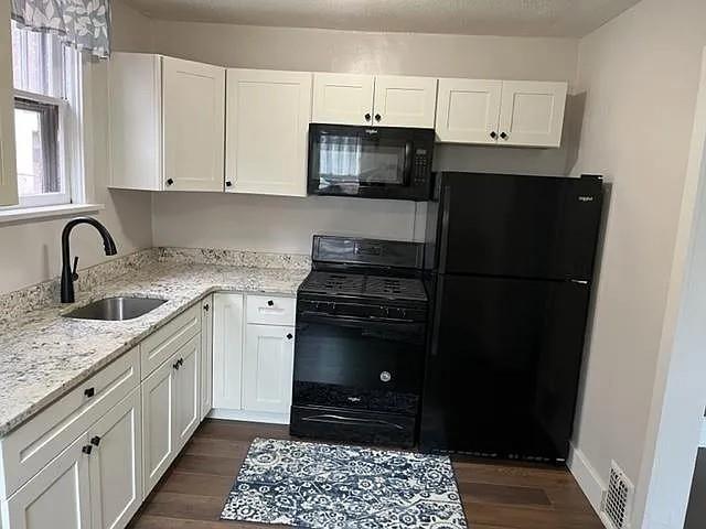 184 Provost Road Pittsburgh, PA 15234 - Photo 19 of 26 a kitchen with a sink and a stove