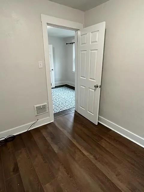 184 Provost Road Pittsburgh, PA 15234 - Photo 24 of 26 an empty room with wooden floor and closet