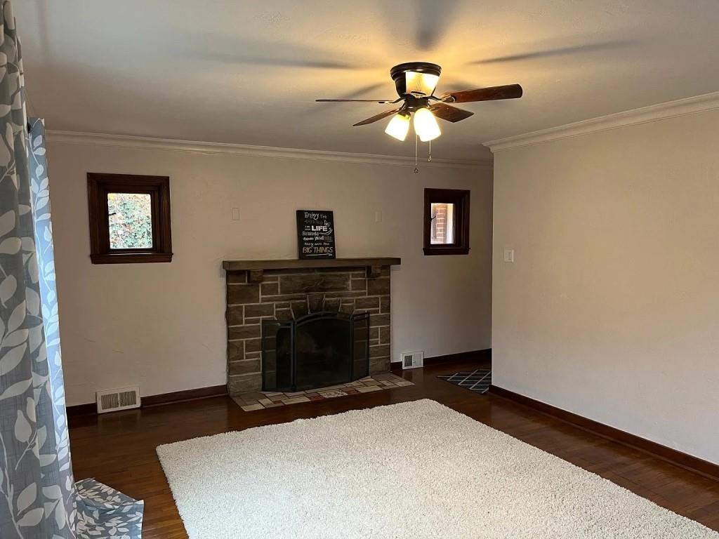 184 Provost Road Pittsburgh, PA 15234 - Photo 5 of 26 a bedroom with a bed and a chandelier