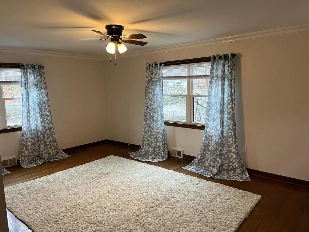 184 Provost Road Pittsburgh, PA 15234 - Photo 6 of 26 wooden floor in an empty room with a window