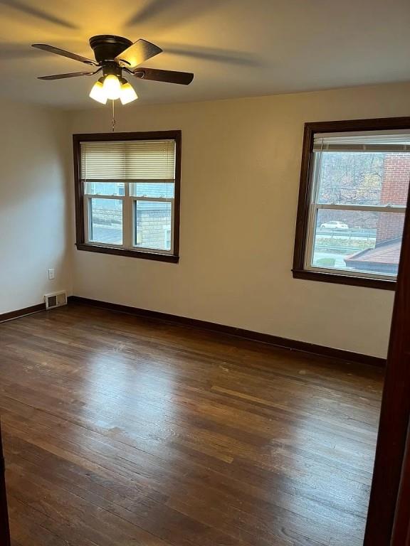 184 Provost Road Pittsburgh, PA 15234 - Photo 9 of 26 a view of an empty room with wooden floor and a window
