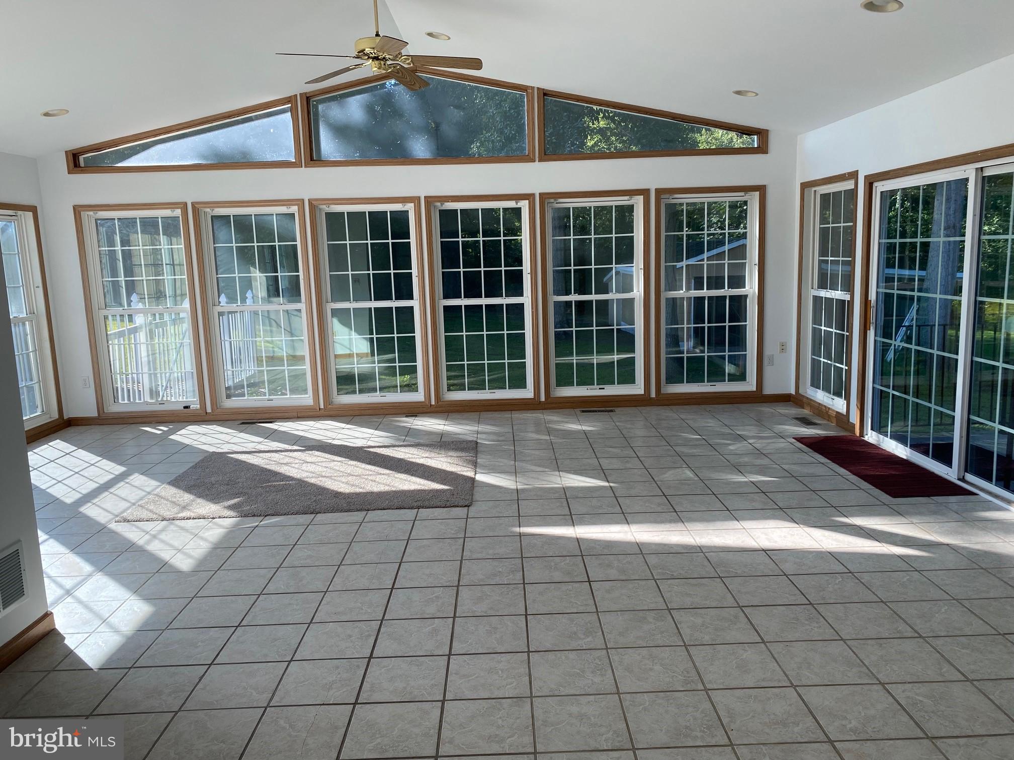 13852 Dulin Road Queen Anne, MD 21657 - Photo 11 of 16 a view of a brick house with windows