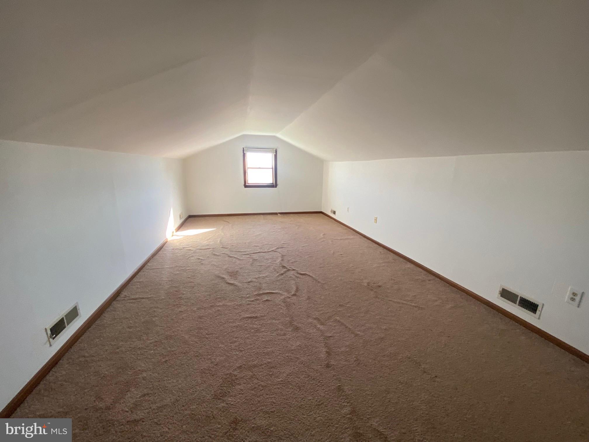 13852 Dulin Road Queen Anne, MD 21657 - Photo 15 of 16 an empty room with windows and entrance