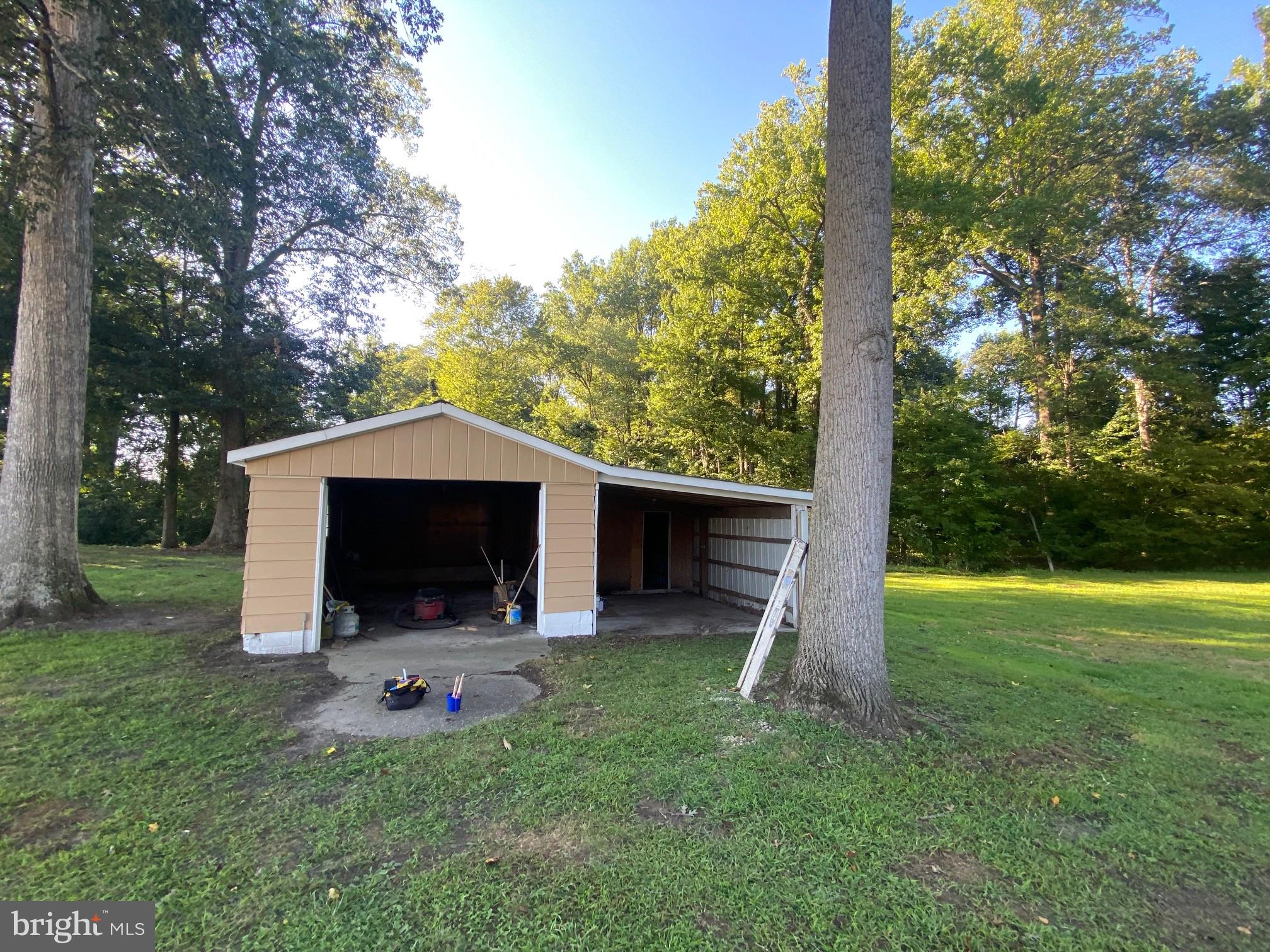 13852 Dulin Road Queen Anne, MD 21657 - Photo 16 of 16 a view of backyard with trampoline