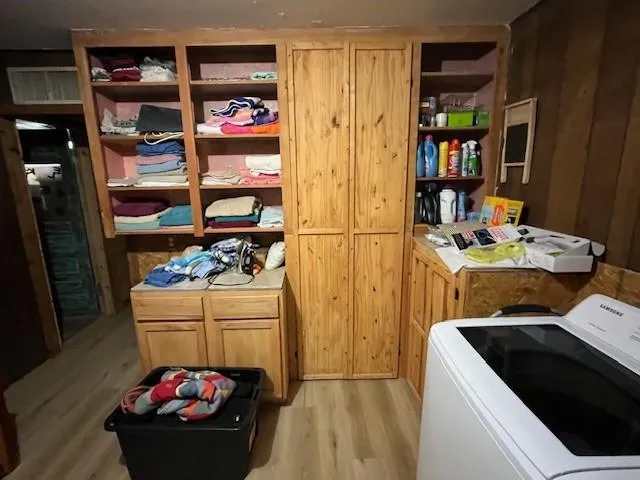 a view of a backyard with plants and outdoor space