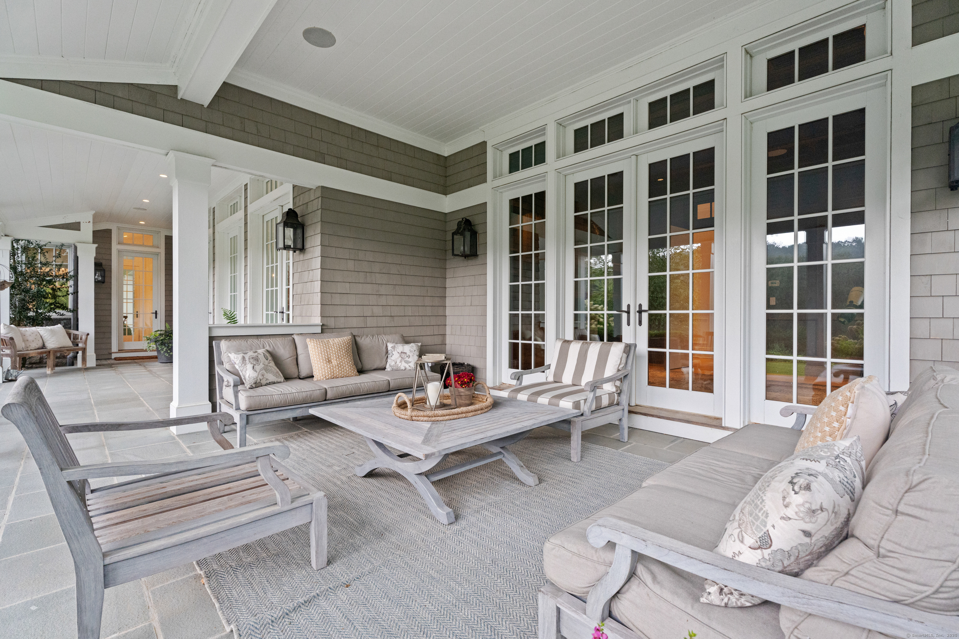 294 Maple Road Easton, CT 06612 - Photo 33 of 40 One of several covered patios, just outside the study, overlooks the serene backyard oasis-perfect for relaxing or entertaining.