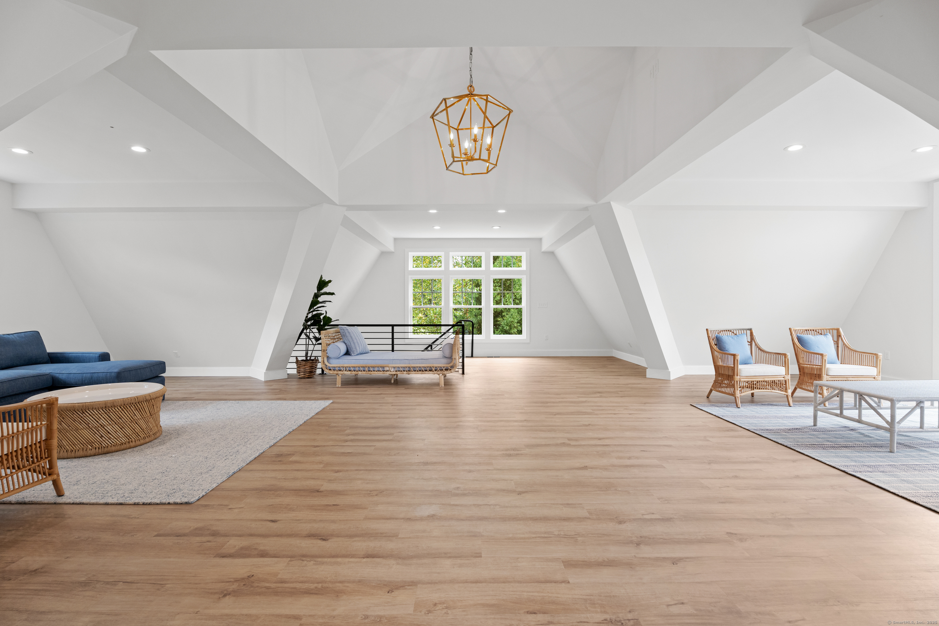 294 Maple Road Easton, CT 06612 - Photo 37 of 40 Large great room in the upper level of the pool house with a full bathroom and balcony.