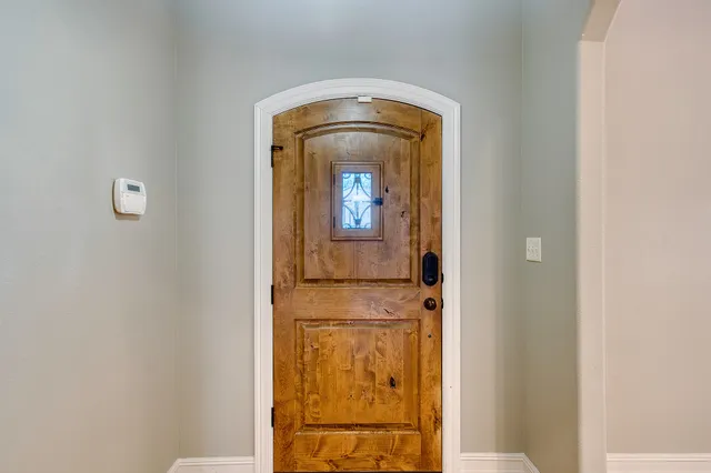 view of a entryway door with wooden floor