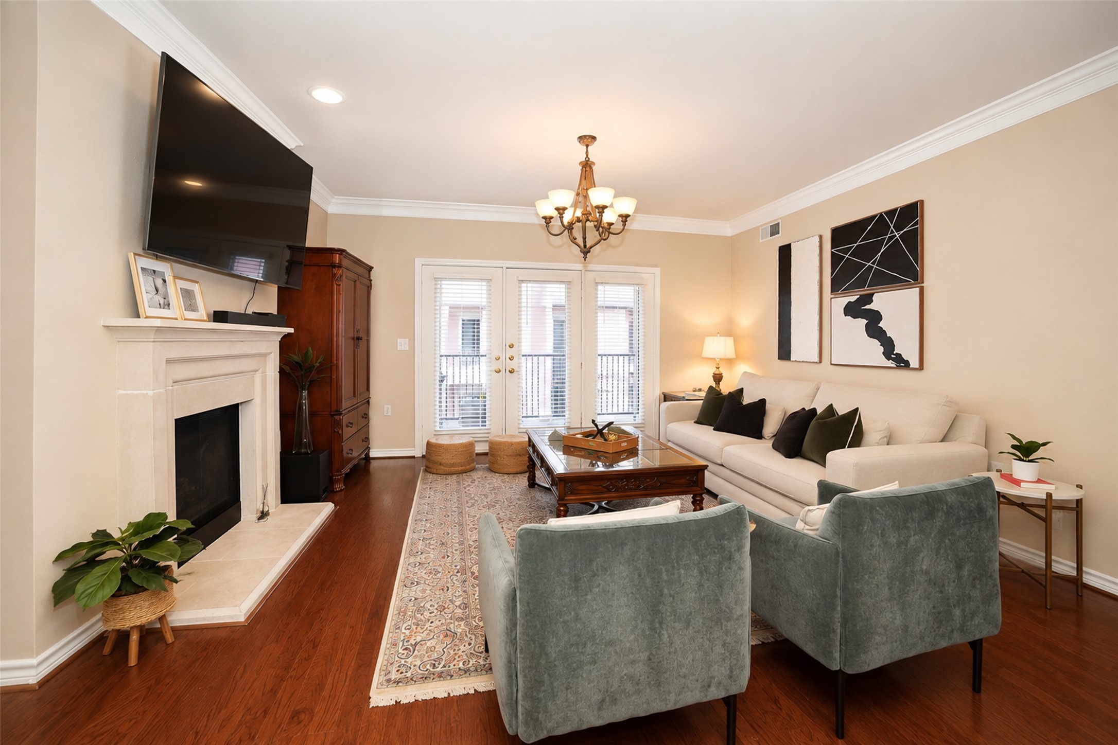 2400 McCue Road, Unit 401 Houston, TX 77056 - Photo 11 of 47 Luxurious and cozy living room with a lot of space and opens to balcony. Home is fully furnished.