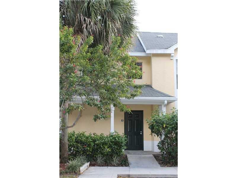 6364 La Costa Drive, Unit B Boca Raton, FL 33433 - Photo 1 of 19 a front view of a house with a yard