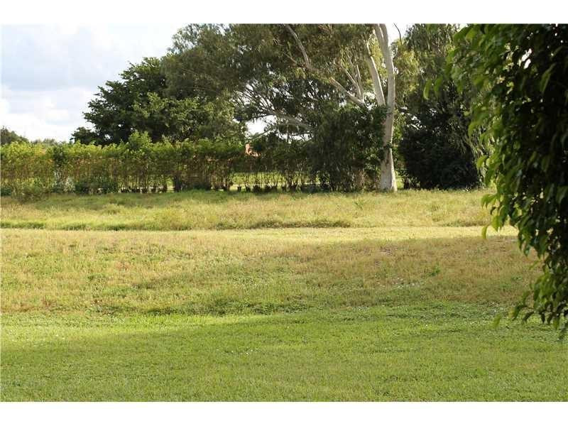 6364 La Costa Drive, Unit B Boca Raton, FL 33433 - Photo 16 of 19 a view of an ocean from a yard