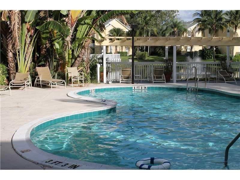 6364 La Costa Drive, Unit B Boca Raton, FL 33433 - Photo 17 of 19 a view of a house with a yard
