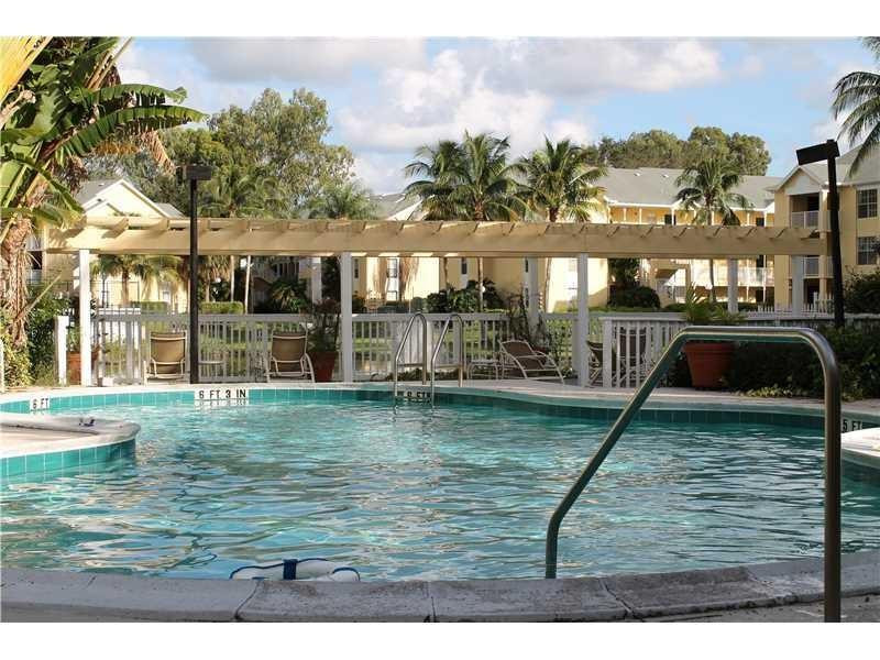 6364 La Costa Drive, Unit B Boca Raton, FL 33433 - Photo 18 of 19 a swimming pool view with a lake view