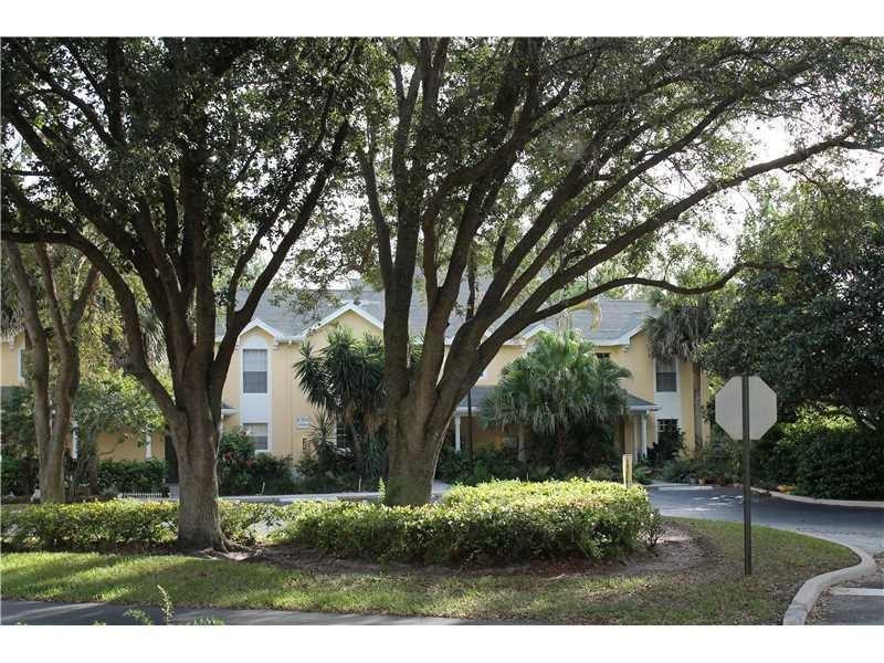6364 La Costa Drive, Unit B Boca Raton, FL 33433 - Photo 3 of 19 a backyard of a house with lots of green space