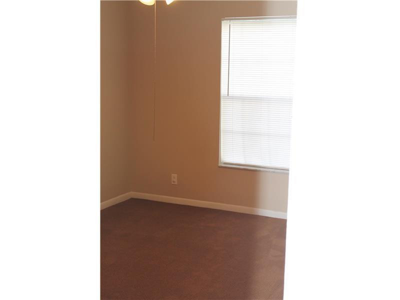 6364 La Costa Drive, Unit B Boca Raton, FL 33433 - Photo 8 of 19 a view of an empty room with a window