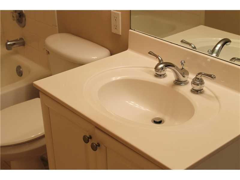6364 La Costa Drive, Unit B Boca Raton, FL 33433 - Photo 10 of 19 a bathroom with a tub