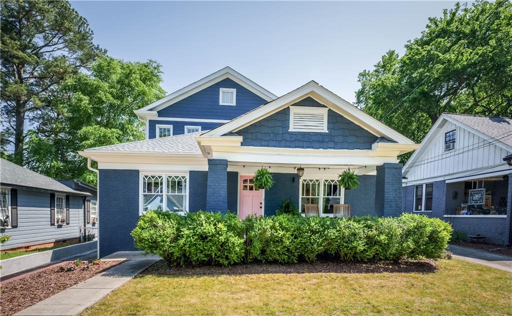 2081 Ridgedale Road Northeast Atlanta, GA 30317 - Photo 1 of 1 a front view of a house with garden