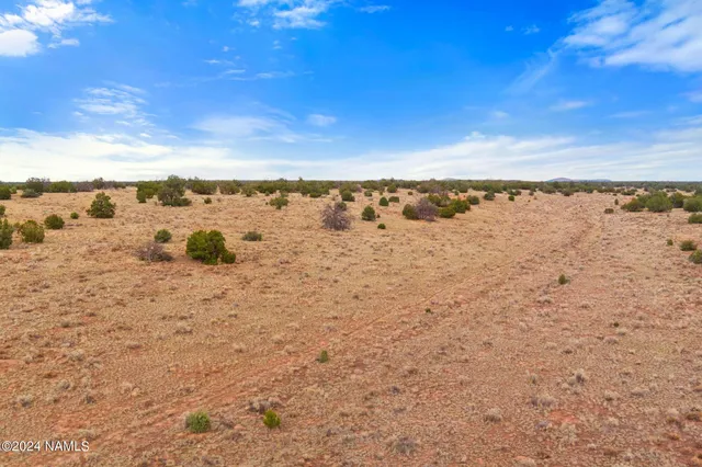 a view of lake with mountain in the background