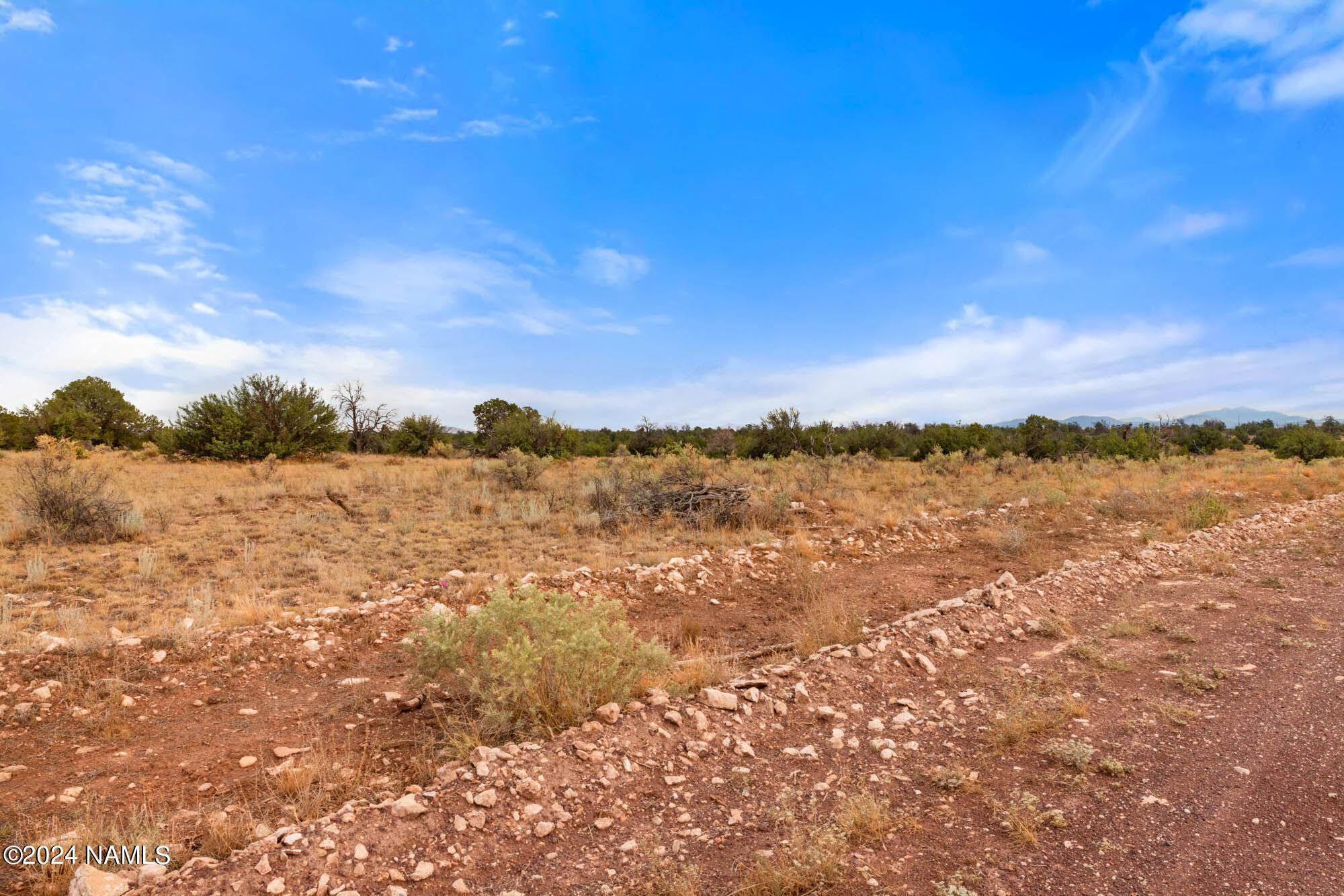 3097 North Peakview Road, Unit LOT B Williams, AZ 86046 - Photo 16 of 31 a view of lake with mountain in the background