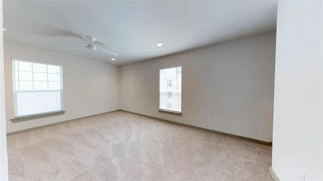 an empty room with windows