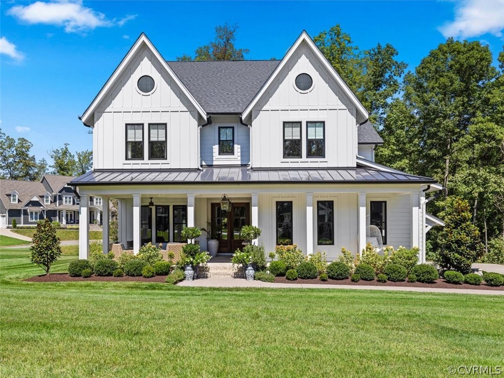 16701 Saville Chase Road Midlothian, VA 23112 - Photo 1 of 50 a front view of a house with a yard and potted plants