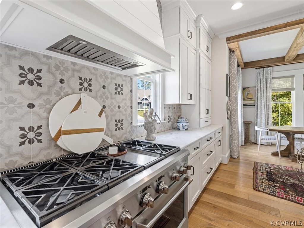 16701 Saville Chase Road Midlothian, VA 23112 - Photo 13 of 50 a kitchen with stove a sink and cabinets