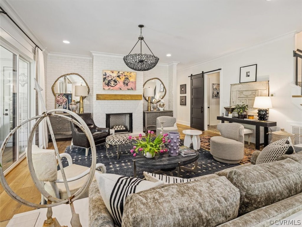 16701 Saville Chase Road Midlothian, VA 23112 - Photo 17 of 50 a living room with furniture chandelier and a mirror