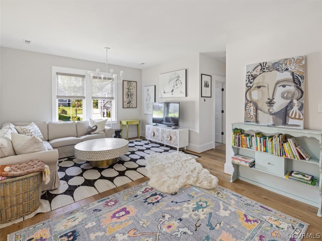 16701 Saville Chase Road Midlothian, VA 23112 - Photo 29 of 50 a living room with furniture and a rug