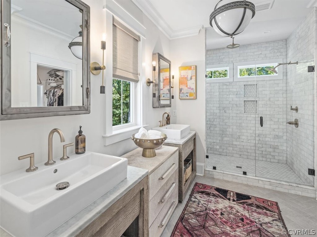 16701 Saville Chase Road Midlothian, VA 23112 - Photo 32 of 50 a bathroom with a sink a toilet and shower