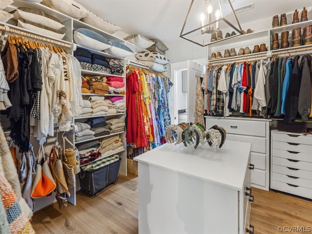 16701 Saville Chase Road Midlothian, VA 23112 - Photo 33 of 50 a view of walk in closet with clothes and shoes