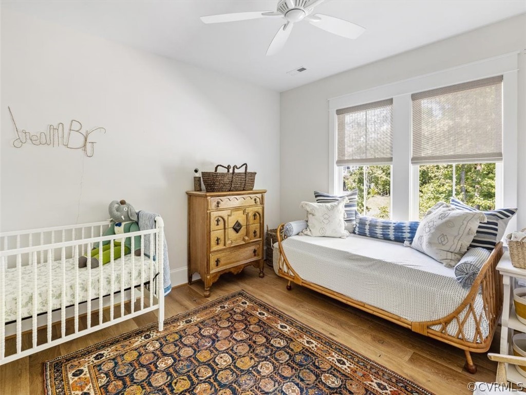16701 Saville Chase Road Midlothian, VA 23112 - Photo 42 of 50 a bedroom with furniture and windows