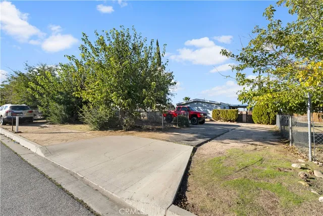 a view of a playground with basketball court
