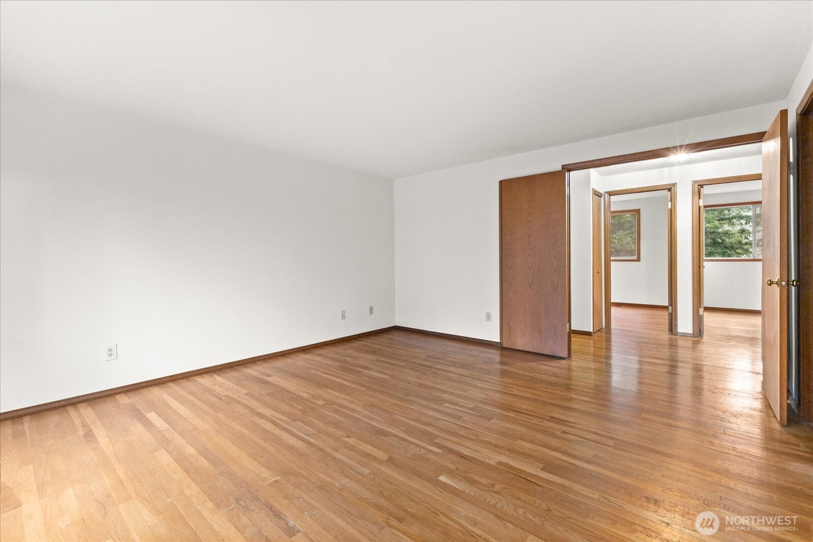 18721 Northeast 133rd Street Redmond, WA 98052 - Photo 15 of 39 a view of an empty room and wooden floor